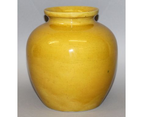 A GOOD 19TH CENTURY CHINESE YELLOW GLAZED PORCELAIN JAR, of ovoid form rising to a short waisted neck with galleried rim, the