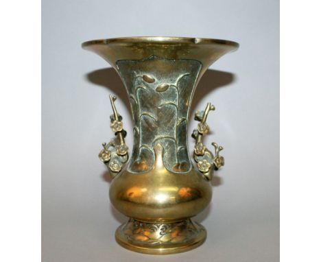 A CHINESE POLISHED BRONZE VASE, possibly 17th/18th Century, with detachable prunus handles, the waisted neck with stylised fo