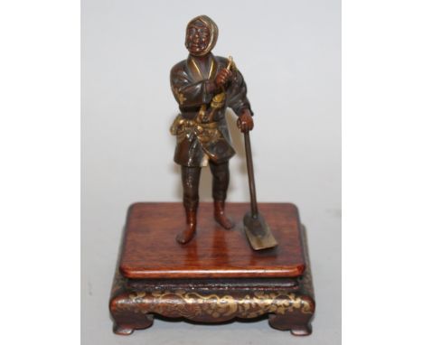 A GOOD SIGNED JAPANESE MEIJI PERIOD EISUKE MIYAO PARCEL GILT BRONZE FIGURE OF A FARMER, mounted on a fixed lacquered wood bas