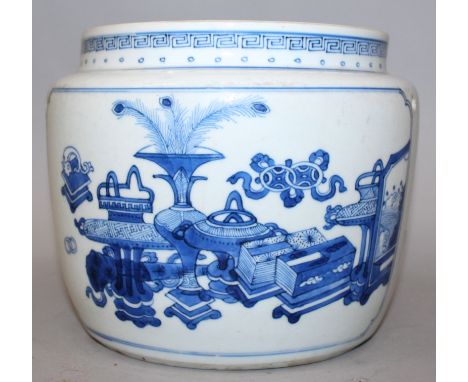 A CHINESE KANGXI PERIOD BLUE & WHITE PORCELAIN JAR, the sides painted with panels of bronze-form vases, ribboned emblems and 