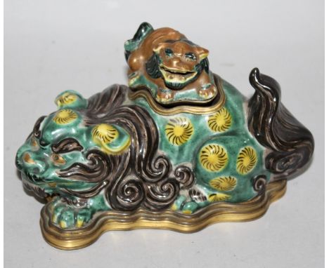 A GILT-METAL MOUNTED LATE 19TH CENTURY JAPANESE KO KUTANI INKWELL, with hinged cover, modelled in the form of a shi-shi, the 