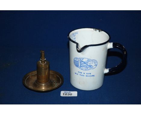 A Cow & Gate enamel measuring Jug and a Brass Lighter.