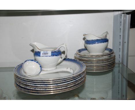 A Burleigh 'Sandon' pattern part Dinner Service comprising eight Dinner Plates, eleven Side Plates, two Jugs, Ladle and two C