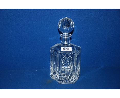 A moulded glass decanter