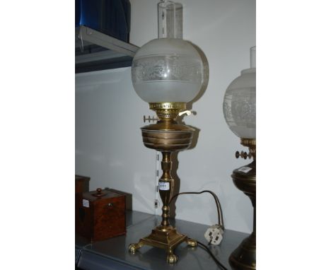 An elegant brass Oil Lamp with chimney and globe  a/f