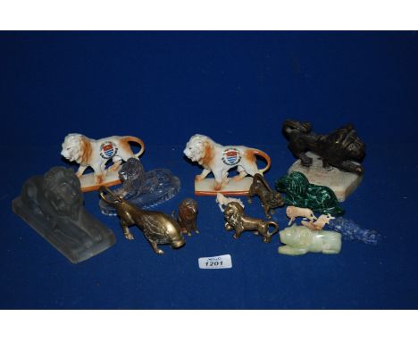 A quantity of model Lions in glass, ceramic and metal, approx. 15