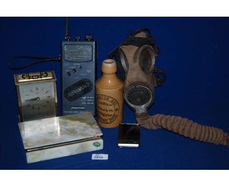 A quantity of miscellanea including a Gas Mask, a 'Sketch'  small stoneware Bottle and an international multi-band compact Ra