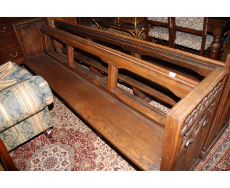 A good mid 19th c. Oak Pew/Bench seat, the top tail having moulded top with three stop chamfered sections separated by cut co