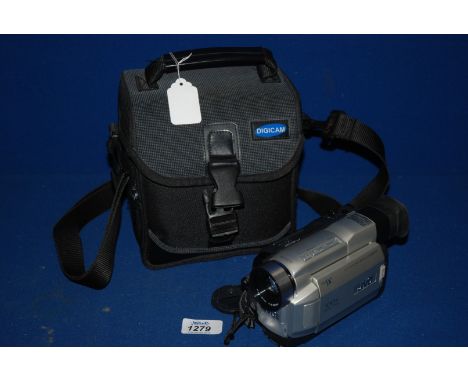 A Panasonic VHS Video Camera with zoom lens and adaptor, with instructions and case.