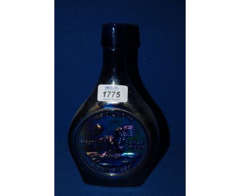 A carnival glass Flask made to commemorate Apollo 11 Moon Landing 1969