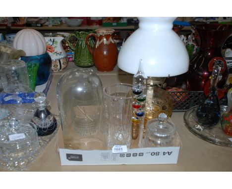 A glass oil lamp, glass weather barometer, two glass preserve pots, etc.