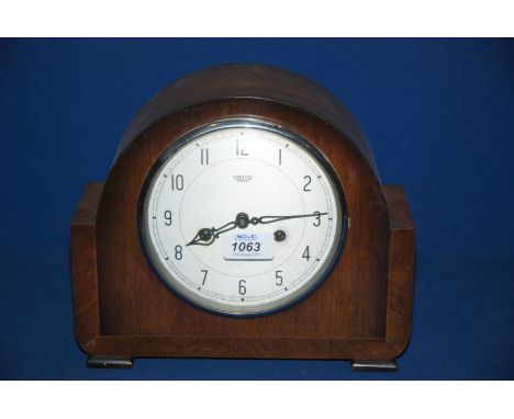 A Smiths Enfield Mantle Clock with key.