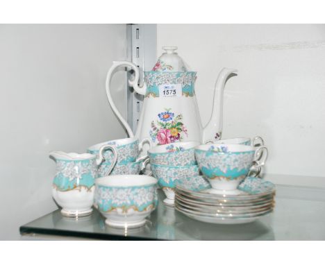 A Royal Albert 'Enchantment' Coffee Set comprising large Coffee Pot, seven Coffee Cups and saucers, Cream Jug and Sugar Bowl
