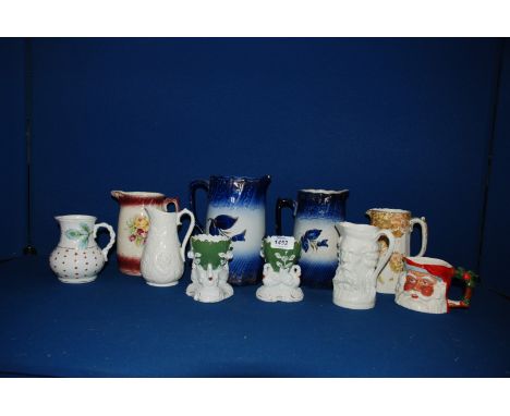 A quantity of various Jugs along with two Goose egg cups