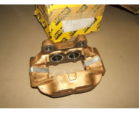A boxed mirrored pair of "four-pot" Rally Car / Competition Car Disc-brake Calipers for upgraded brake performance and believ
