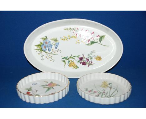 A large Royal Worcester oval Dish and 'Evesham' flan Dish together with a Spode 'Narcissus and Crowea' flan Dish.