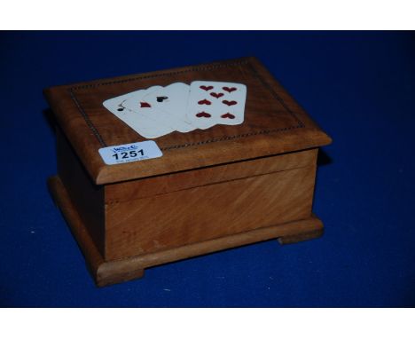A wooden Playing Card Box.