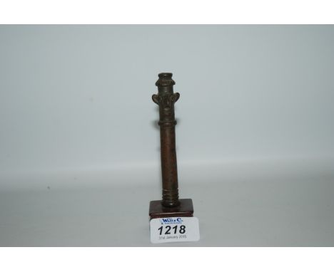 A good quality Luristan anthropomorphic tube finial c. 1000-1200 BC, mounted.  5" including base