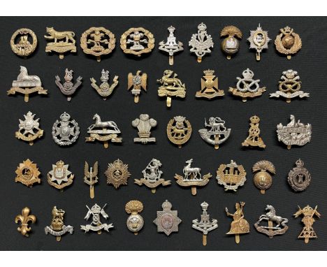 WW2 British Cap Badges along with some WW1 cap badge collection of 40 plus badges to include: Robin Hood Rifles: East Surreys