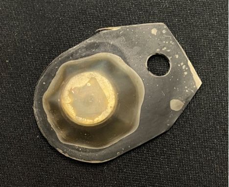 WW2 British Escape and Evasion Compass contained in a soft black plastic pouch. Could be worn around the neck on a cord and s