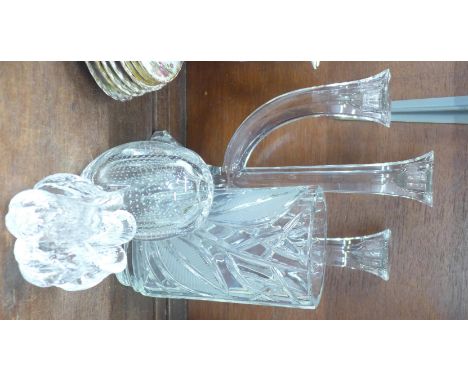 A Nachtmann glass candlestick, two glass vases and a tea light