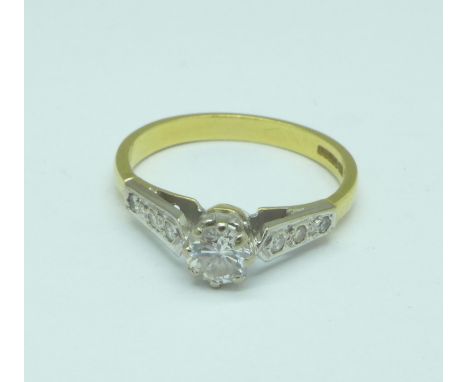 An 18ct gold and diamond ring, 2.8g, over 0.25 carat diamond weight, 2.8g, N