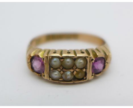 A Victorian 9ct gold, amethyst and seed pearl ring, Birmingham 1876, 2.2g, M