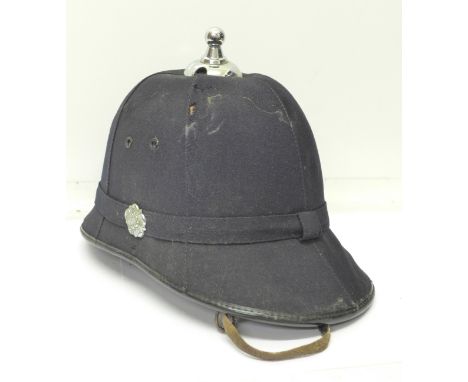 An Edwardian six panel policeman's helmet