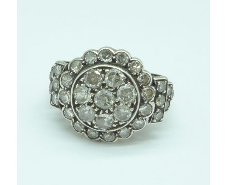 An 18ct gold Art Deco diamond cluster ring, set with thirty-six diamonds, diameter of top 15mm, 6.1g, O