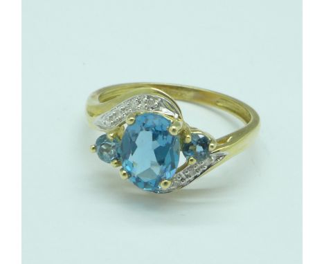 A 9ct gold, topaz and diamond ring, 2.6g, P