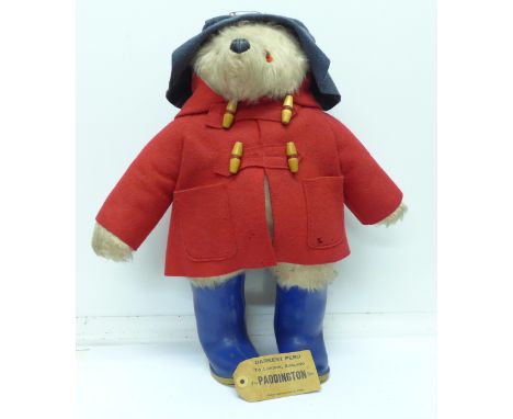 A 1970's Paddington bear with blue Dunlop Wellington boots