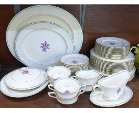 A Royal Worcester Florizel dinner service comprising dinner, tea and side plates, soup bowls, gravy boat and graduated plates