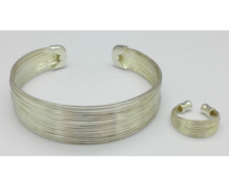 A silver bangle and a silver ring, marked 925