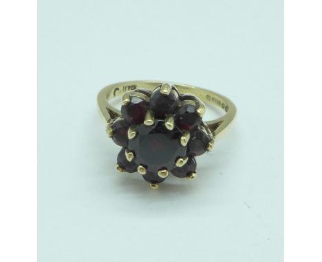 A 9ct gold and garnet cluster ring, 2.7g, G