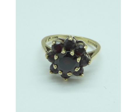 A 9ct gold and garnet cluster ring, 2.7g, G