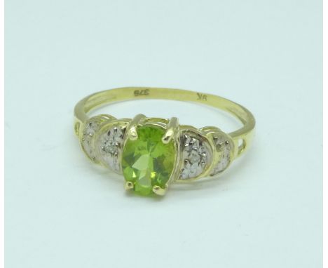 A 9ct gold, peridot and diamond ring, 1.3g, O