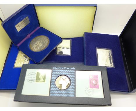 Three silver proof stamps, a silver map medallion and a silver Franklin Mint ingot