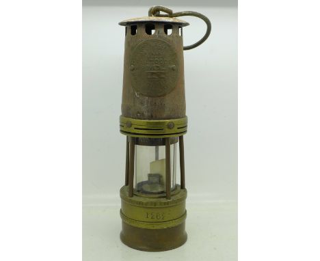 A Hailwoods miner's safety lamp