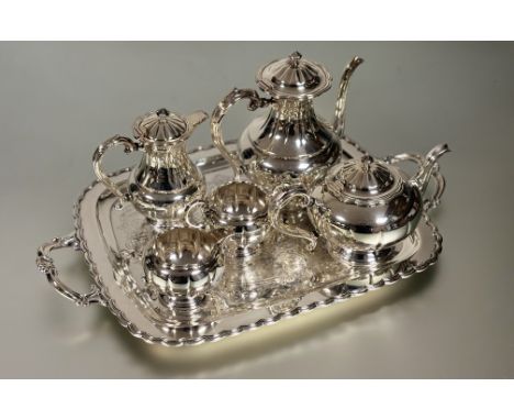 A classic six-piece tea and coffee service to include a two-handled tray: h. x 2.5cm L. x 63cm w. x 39cm, coffee pot: h. x 24