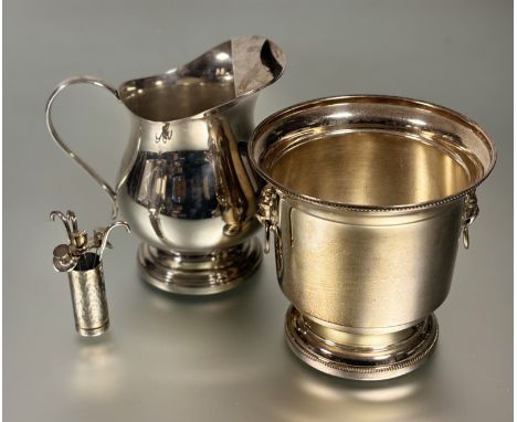An epns iced water jug of baluster form: h. x 18cm and an epns wine cooler with lion ring mask handles to side on a beaded ba