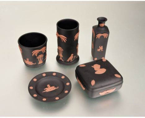 A collection of Wedgwood Egyptian black basalt and terracotta jasperware comprising, a bottle vase (h-13.5cm), a trinket box 