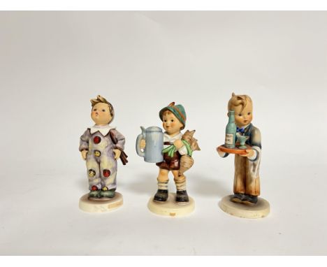 A collection of West German M.J. Hummel Goebel Pottery figurines comprising, 'Carnival' (h. 15cm), 'For Father' (h. 15cm), an