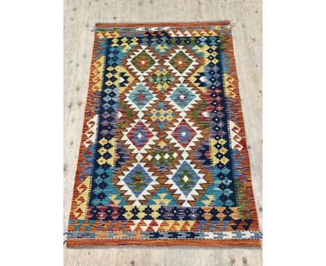 A large multi coloured chobi kilim runner, with geometric design, 158cm x 106cm