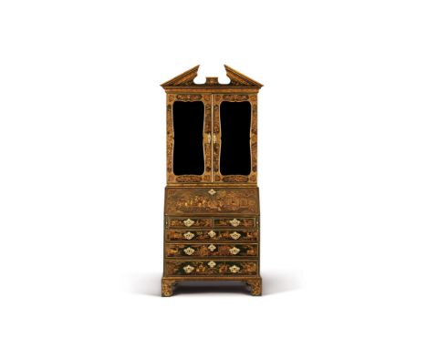 A George II Green Japanned Bureau Bookcase England circa 1730, attributed to Giles Grendey, the cresting in the form of a bro