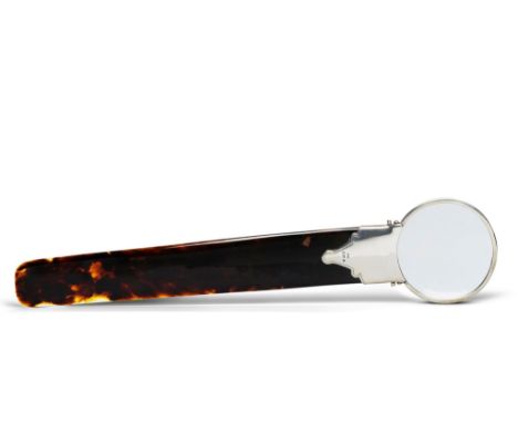 A Tortoiseshell and Silver Page Turner England circa 1913, of large scale with silver mounted magnifying glass finial, the si