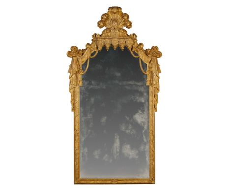 An Early 18th Century German Pier Mirror Germany circa 1710, the cresting modelled in the highly individual manner of a pair 