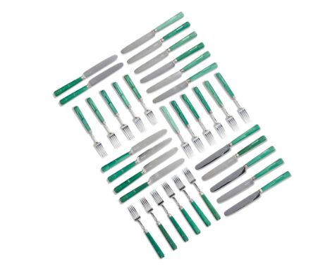 A Set of Regency Flatware England circa 1818, comprising 17 knives and 17 forks, with carved and green stained ivory handles 