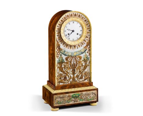 A Charles X Mantel Clock France circa 1830, the finely figured mahogany frame is mounted with engraved and painted silvered m