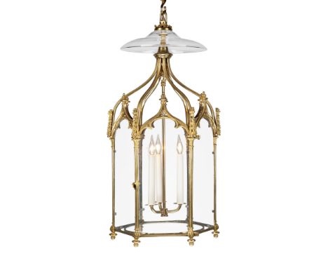 A Regency Brass Gothic Lantern England circa 1810, each face is surmounted by a Gothic ogee arch and flanked by stylized spir