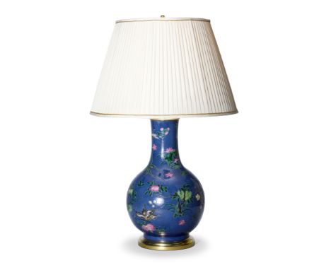 A Blue Ground Chinese Vase Mounted as a Lamp China circa 1830, with tall neck, decorated with flowers, foliage, fruits, butte